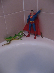 Superman stomps on snakes...